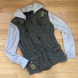 Green and gray jacket with black and gold floral patchwork